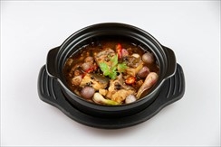 Simmered black king with pork belly in clay pot