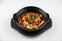 Simmered grouper with pork belly and green pepper in clay pot