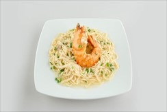 Fried big tiger prawn served with yellow egg noodles in special sauce (1pcs)